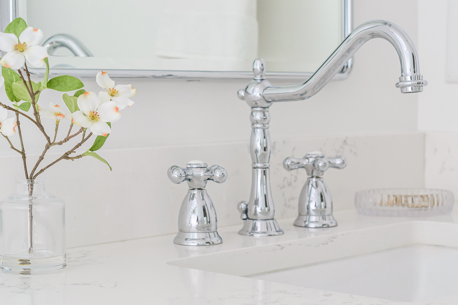 Timeless bathroom faucet shown as an example of a silver plumbing fixture that fits the interior design Silvers Trend