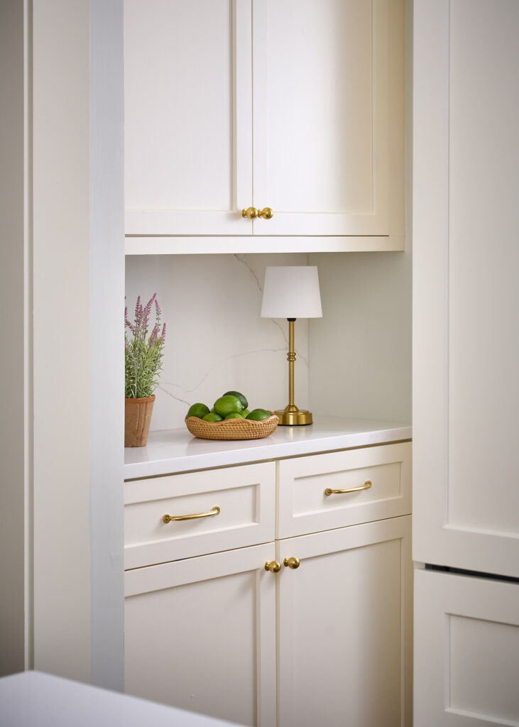 photo of classic kitchen showing the use of brass cabinet hardware by an Atlanta interior designer in a Buckhead home.