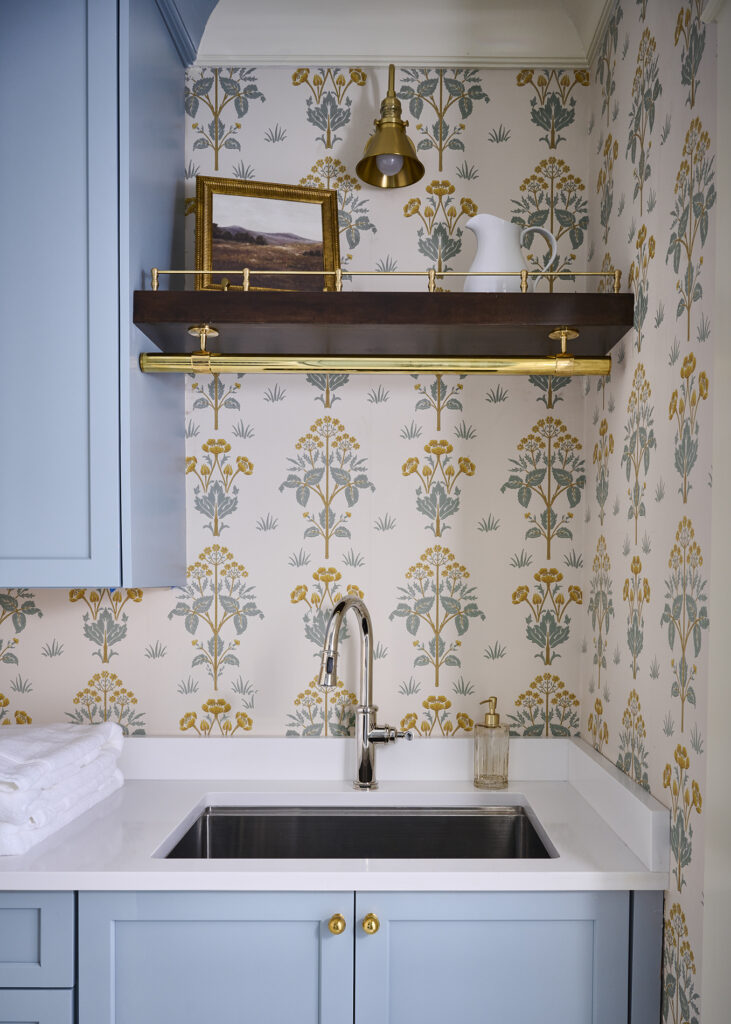 photo of new traditional laundry room in a Buckhead home showing the use of brass hardware by Atlanta interior designer.